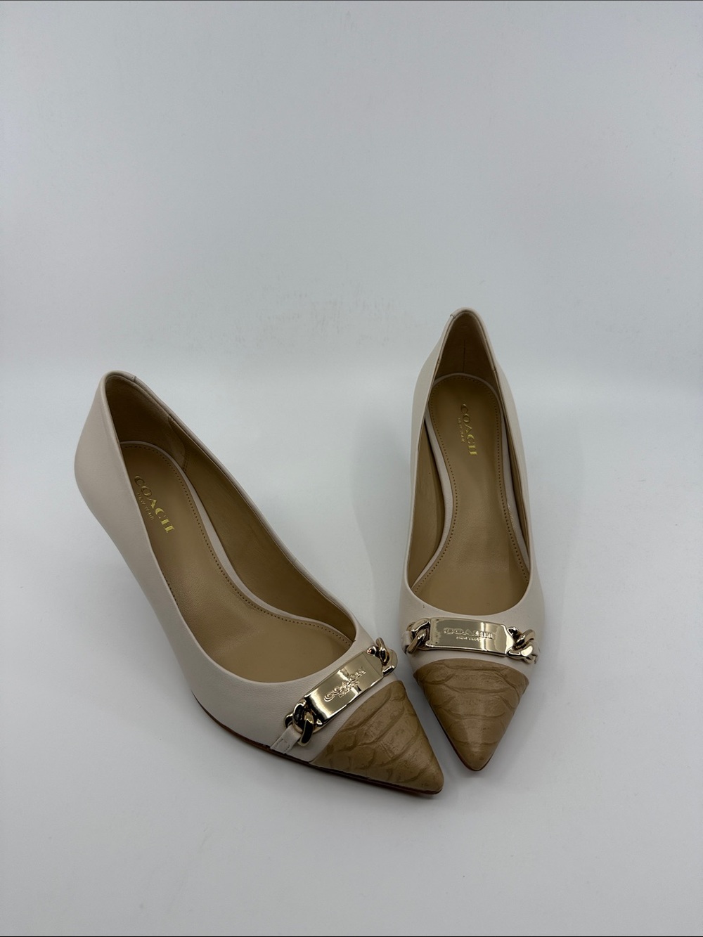 Coach Cream and Tan Pointed Toe Heels with Gold Plaque